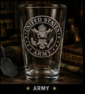 Clear glass with United States Army emblem on a wooden surface with military-themed decor.