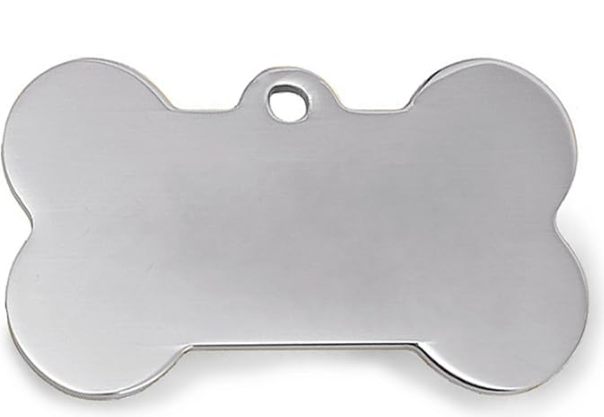Metallic bone-shaped tag on a white background