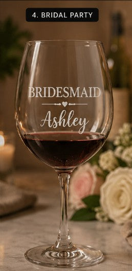 Wine glass with 'Bridesmaid Ashley' engraving on a blurred background
