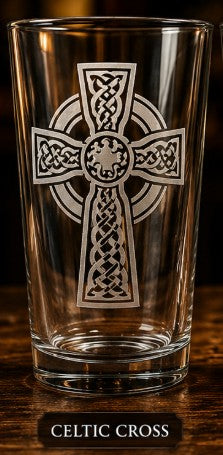 Clear glass with Celtic cross design on a dark background