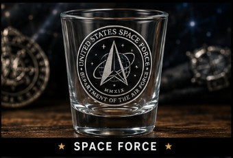 Glass with United States Space Force emblem on a dark background