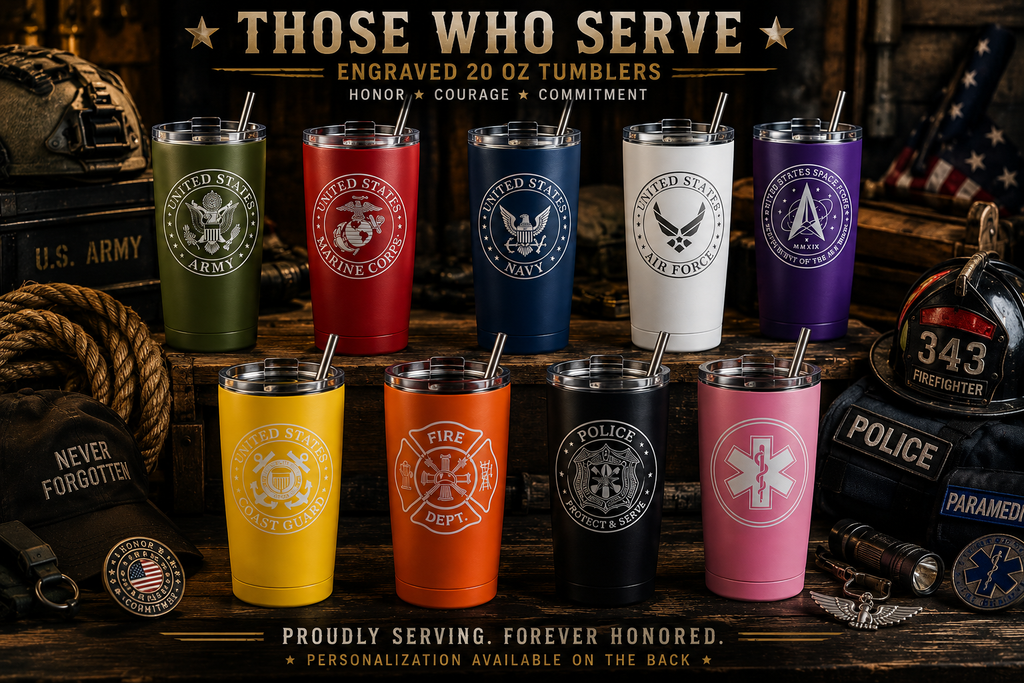Collection of engraved tumblers in various colors with military and emergency service logos on a wooden surface.
